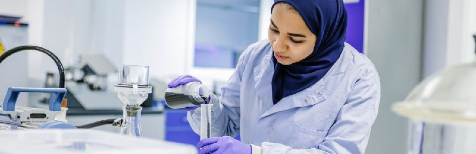 female undergraduate student working in the civil engineering lab.