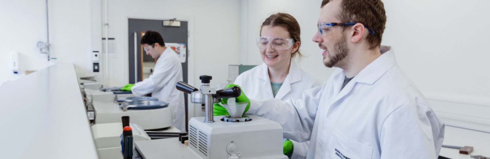 Students doing experiments in the materials science lab