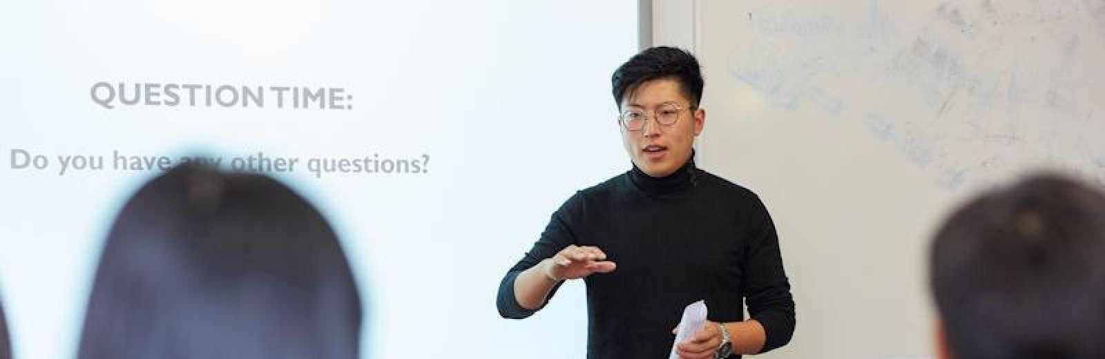 Image of student giving a presentation